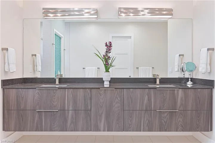 Bathroom featuring double vanity
