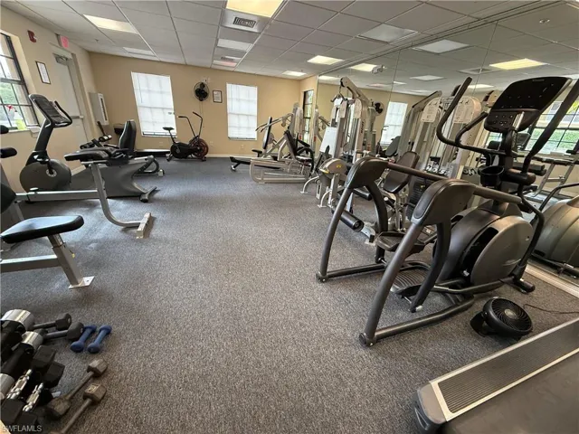 Clubhouse Workout area with a drop ceiling