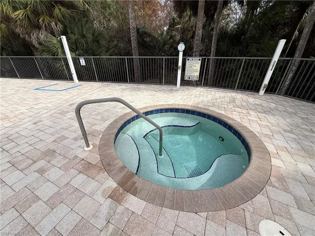 Community hot tub and a patio area