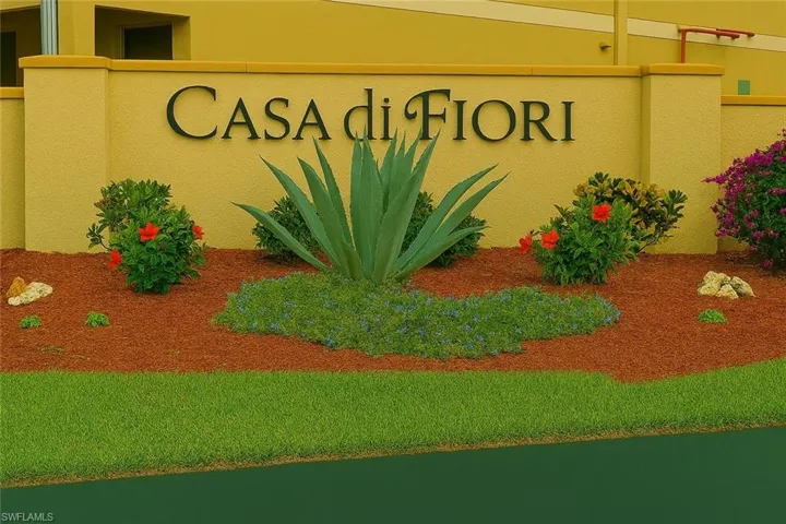 Community sign featuring a lawn