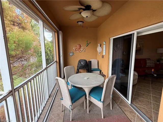 Lanai sitting area featuring ceiling fan