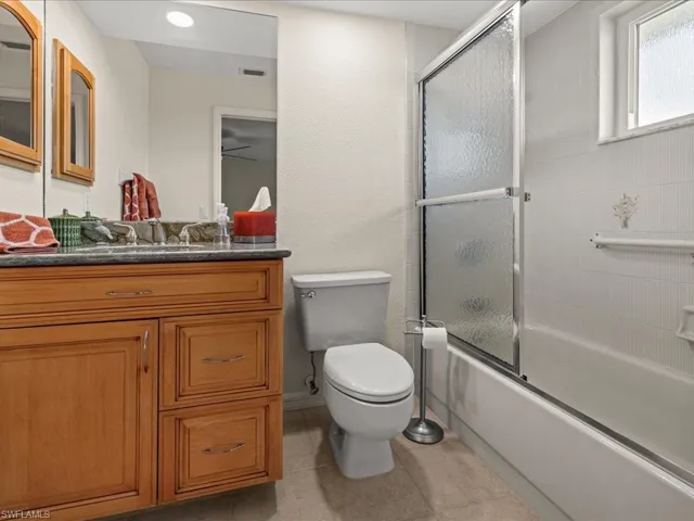 GUEST SUITE/BEDROOM FOUR BATHROOM. ONE OF FOUR FULL BATHROOMS