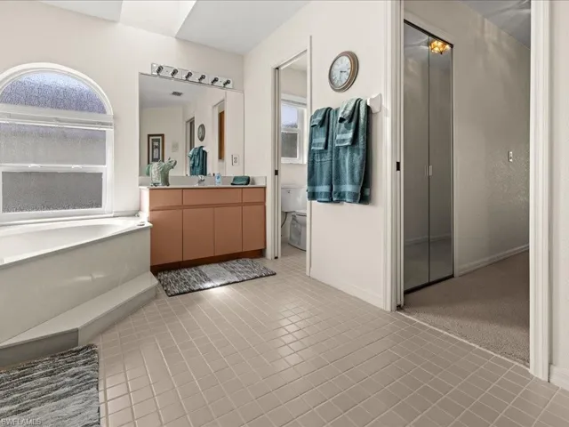 MASTER BATHROOM. ONE OF FOUR FULL BATHROOMS