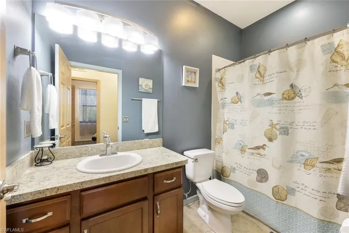 Misc room featuring light wood-style flooring and ceiling fan