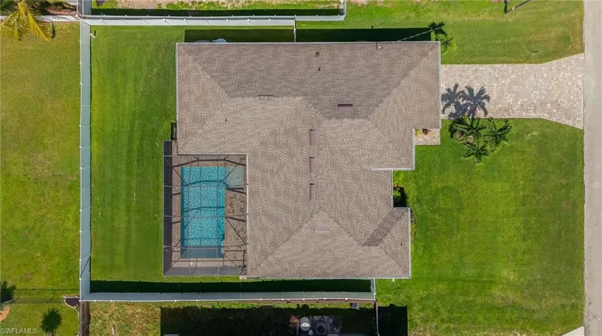 View of subject property featuring a pool and 2023 NEW ROOF