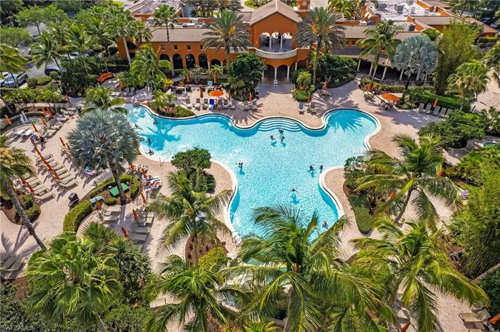 Community pool featuring a patio