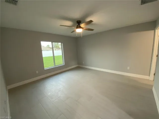 Unfurnished room with ceiling fan
