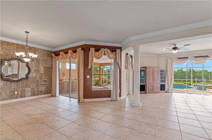 Formal dining overlooking the pool/lanai
