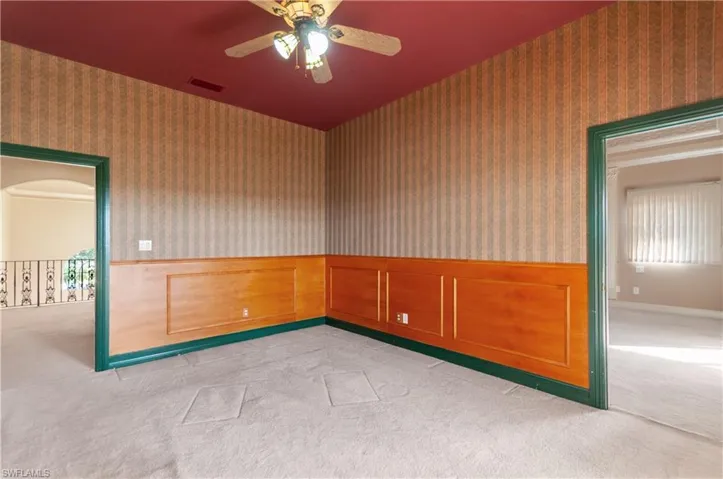 2nd floor office accessible from the primary suite, balcony and hallway