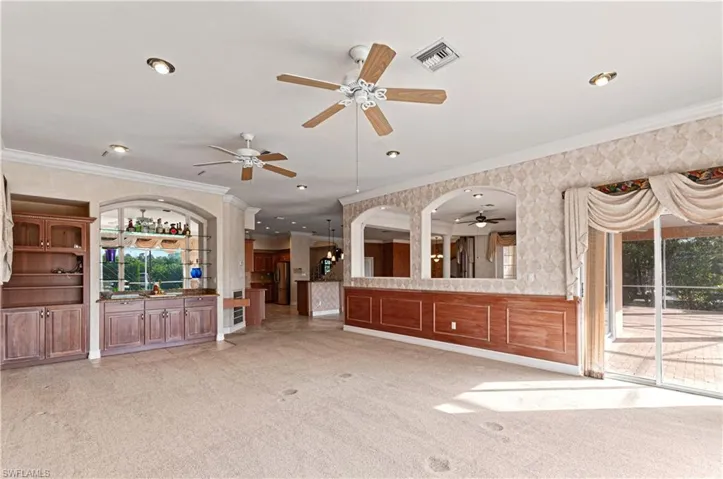Game room with built in bar area