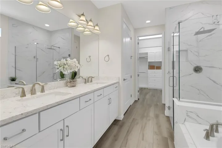 Master bath w/ marble, walk-in shower & separate tub