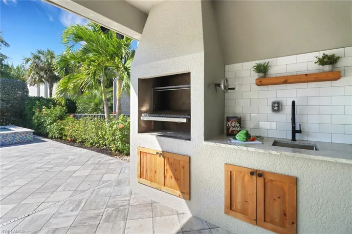 View of patio / terrace- custom charcoal/wood fire grill