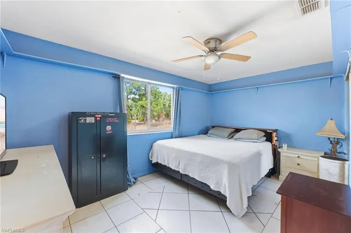 3rd Bedroom featuring a ceiling fan and light tile patterned floors