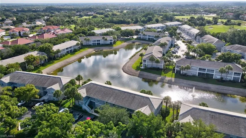 Aerial perspective showcasing a pond with a central fountain