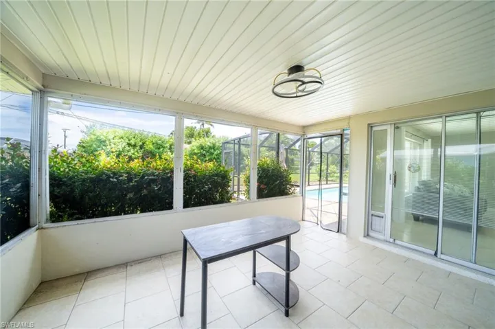 Unfurnished sunroom with plenty of natural light
