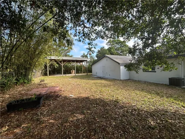 View of yard featuring a carport