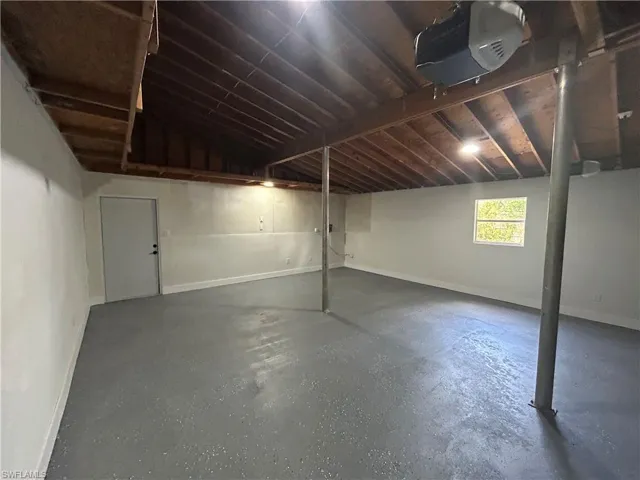 Below grade area featuring baseboards