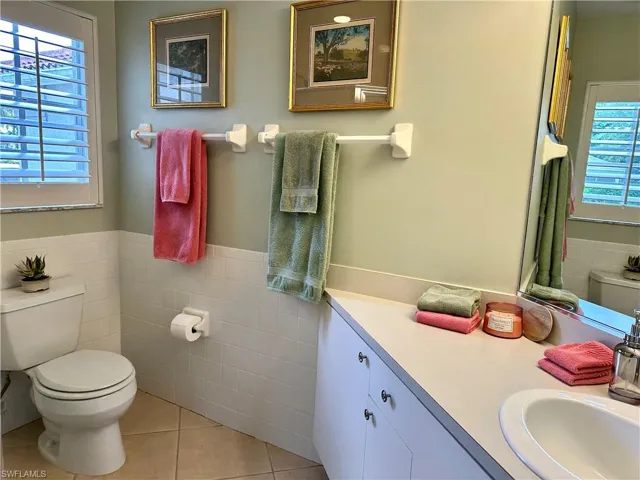 The 2nd bath is adjacent to bedroom 2 and 3.  It has a shower and single sink.