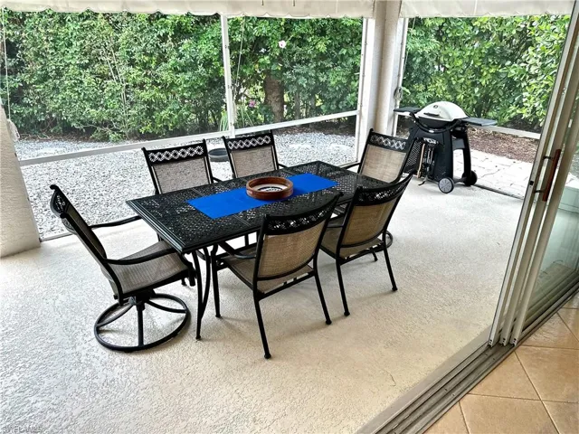 The patio has plenty of room for dining and cooking outdoors.