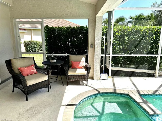 There is a haded sitting area just outside the main bedroom.