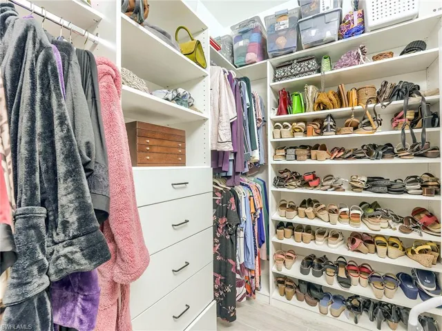 In addition to this custom closet there are 2 others located in the primary suite!!