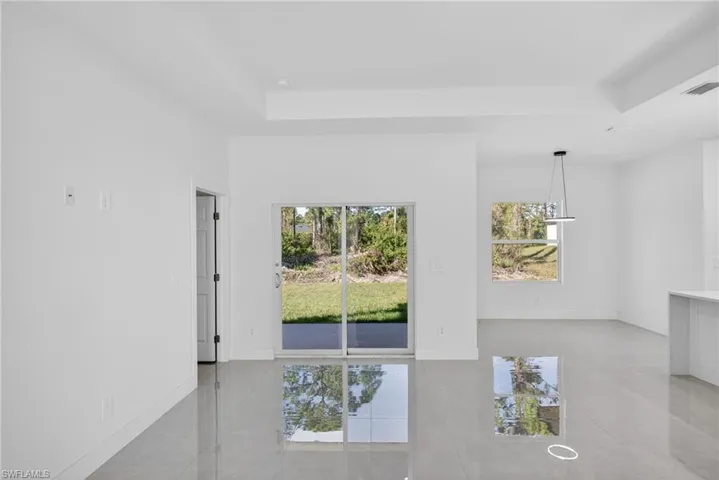 Easy indoor–outdoor living with covered lanai, ideal for immediate move-in.