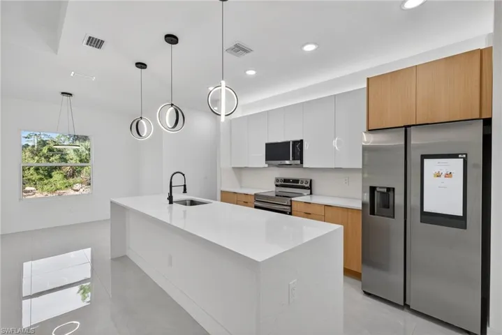Turnkey kitchen with premium finishes — no upgrades needed after closing.