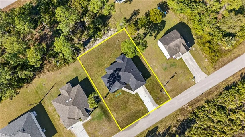 Quarter-acre lot with completed new home — seller offering closing cost assistance with full-price offer.