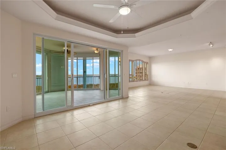 Living room with tray ceiling,