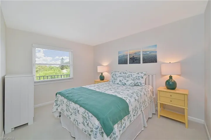 Neutral wall colors, horizontal window blinds, and white baseboards