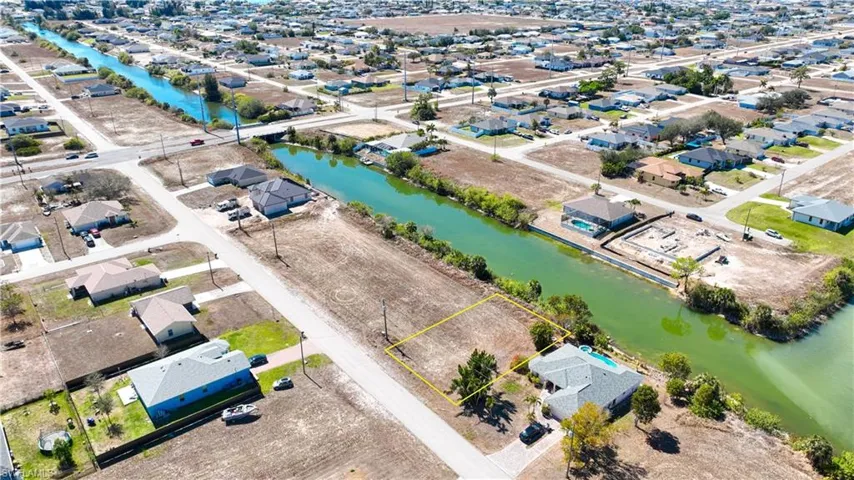 Aerial view of residential area with a large body of water