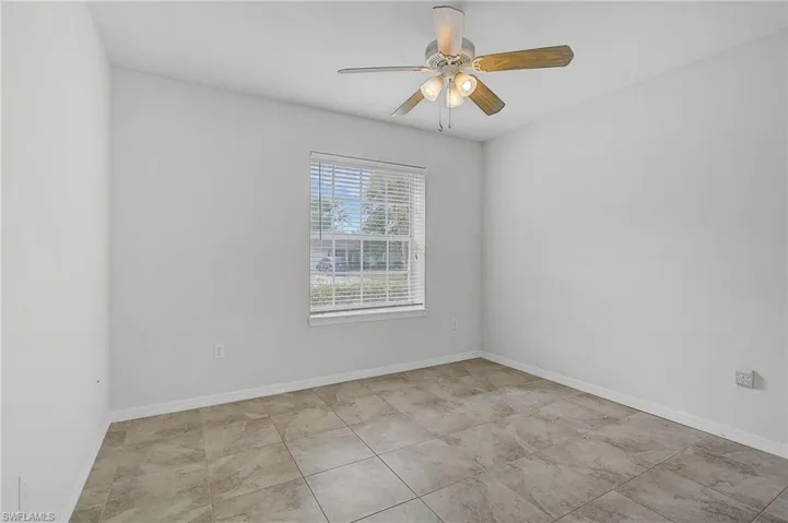 Bedroom #3 with baseboards and a ceiling fan