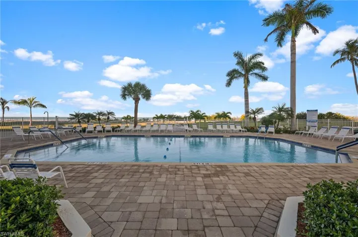 Community pool with a patio area