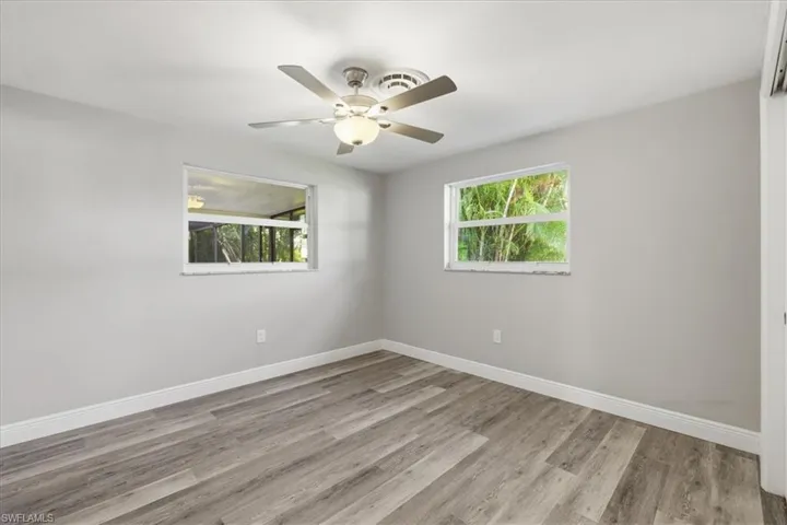 Unfurnished room #1 with a ceiling fan and light wood finished floors