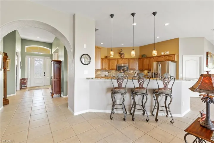 Front Entrance (Designed Glass Single Door with Two Glass Sidelights), Foyer, Hallway & Kitchen Seating Area