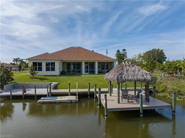Polywood dock (2017 - 565 sq ft) with Tiki Hut (2016), Kayak Launch, Floating Boat Dock (2018), Seawall (in 2 out of 4 lots) & Cantilever Concrete Dock