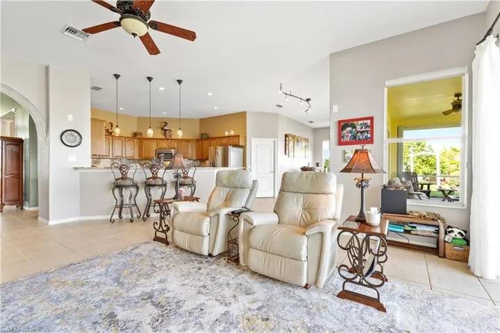 Spacious & Bright Living Room - Furniture is Negotiable! Tile throughout the Home