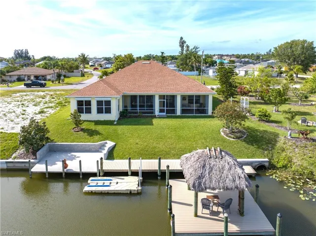 Polywood dock (2017 - 565 sq ft) with Tiki Hut (2016), Kayak Launch, Floating Boat Dock (2018), Seawall (in 2 out of 4 lots) & Cantilever Concrete Dock