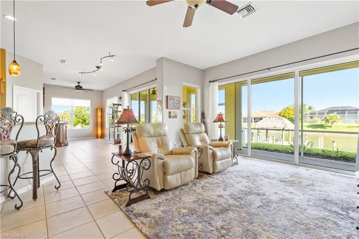 Living Room with Adjacent Florida Sunroom