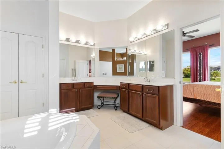 Sizeable Master Bathroom with DUO Vanities and sinks
