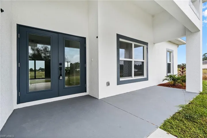 Doorway to property with a patio and french doors