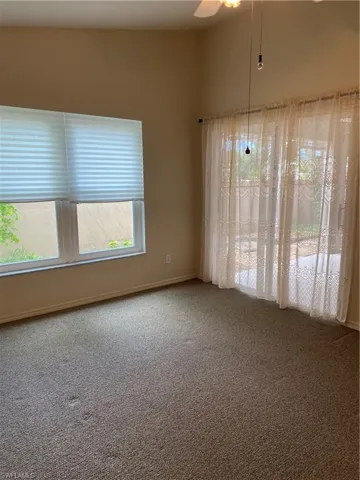 Master Bedroom  with ceiling fan and carpet flooring
