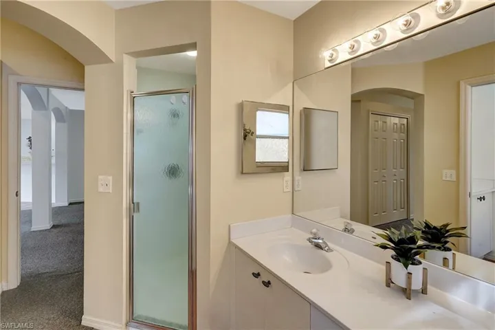 Master Bathroom view of walk in shower door.