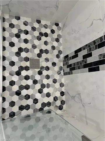 Interior details featuring a shower