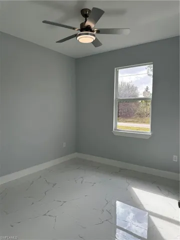 Unfurnished room with ceiling fan