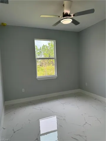 Empty room with ceiling fan