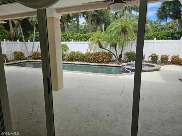 View of swimming pool with a patio
