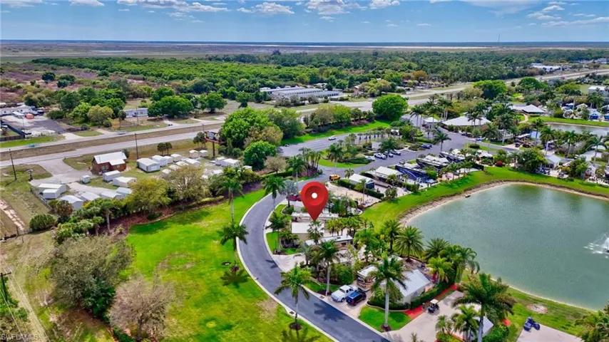 Aerial view of residential area with a large body of water
