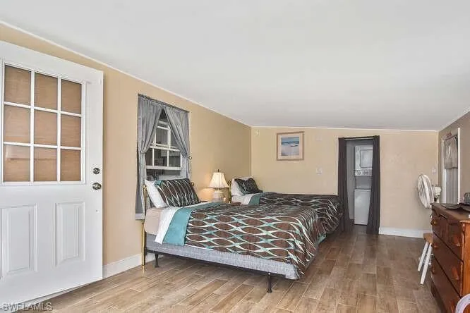 Bedroom #2 featuring wood finished floors
