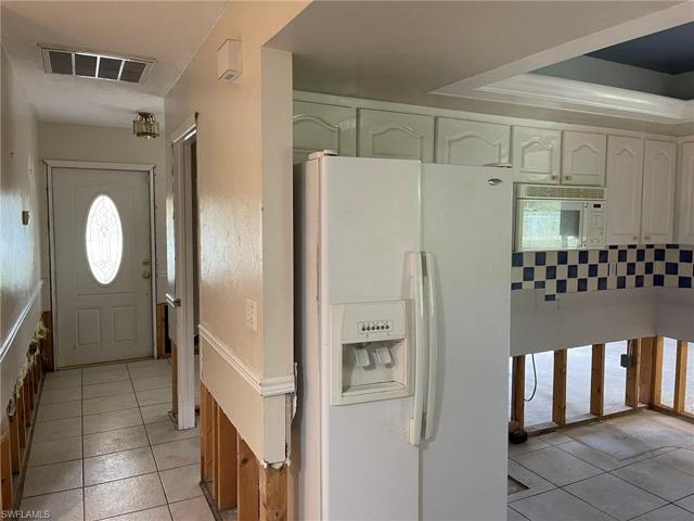 Entry Hallway and Kitchen View